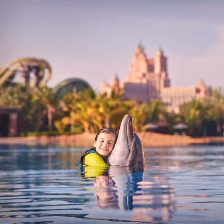 Diving and playing with dolphins at Atlantis